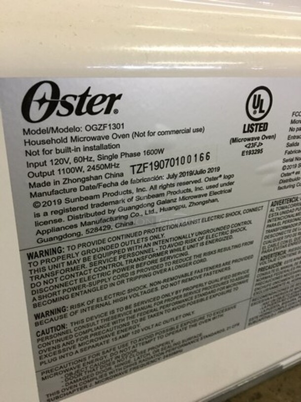 SWEET! Oster Countertop Microwave Oven! All Stainless Steel Body! With View Through Door! Model OGZF1301! 120V! Working When Removed! - Image 5 of 8