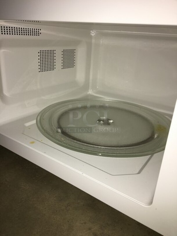 SWEET! Oster Countertop Microwave Oven! All Stainless Steel Body! With View Through Door! Model OGZF1301! 120V! Working When Removed! - Image 6 of 8