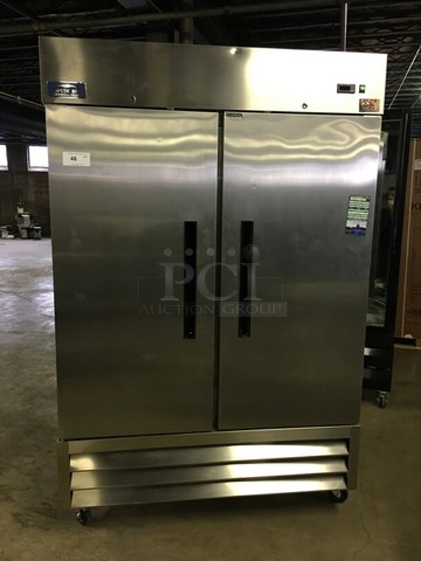 NICE! LATE MODEL Artic Air Commercial 2 Door Reach In Freezer! With Poly Coated Racks! All Stainless Steel! Model AF49 Serial 6180955! 115V! On Commercial Casters! Working When Removed!