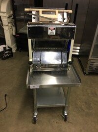 BEAUTIFUL! LATE MODEL 2018 BARLEY USED! Doyon Commercial Electric Bread Slicer! On Stainless Steel Commercial Equipment Stand! With Underneath Storage Space! Model SM302B Serial DYN1801046! 120V 1Phase! On Casters! Working When Removed!
