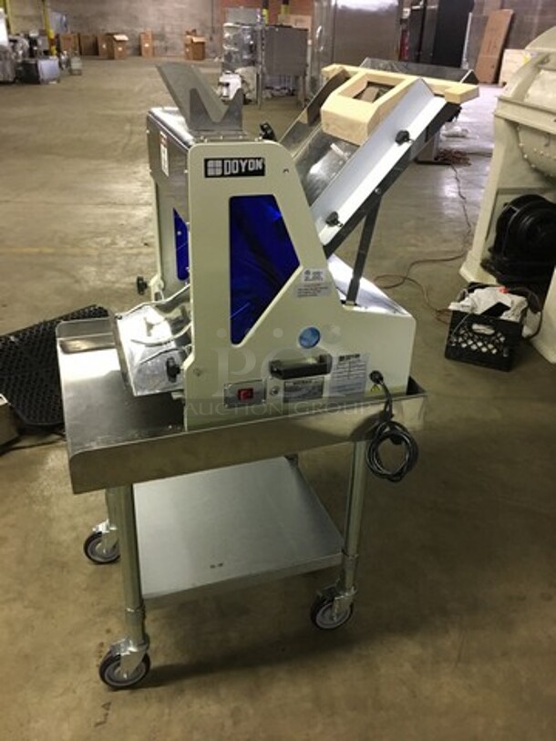 BEAUTIFUL! LATE MODEL 2018 BARLEY USED! Doyon Commercial Electric Bread Slicer! On Stainless Steel Commercial Equipment Stand! With Underneath Storage Space! Model SM302B Serial DYN1801046! 120V 1Phase! On Casters! Working When Removed! - Image 2 of 11