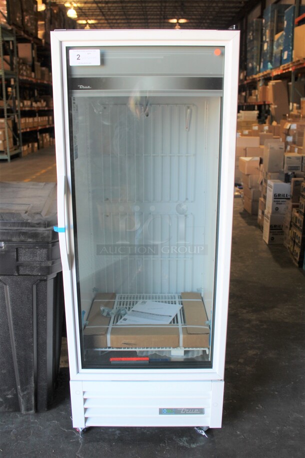 BRAND NEW! True Model GDM-12F-HC-TSL01 Commercial Glass Door Merchandising Freezer On Commercial Casters. 24.5x25x65. 115V/60Hz. 