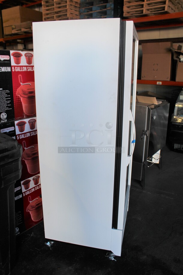 BRAND NEW! True Model GDM-12F-HC-TSL01 Commercial Glass Door Merchandising Freezer On Commercial Casters. 24.5x25x65. 115V/60Hz.  - Image 6 of 6