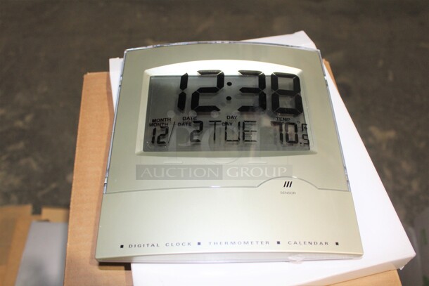 NEW IN BOX! 12 Equity Time Digital Wall Mount Clock, Thermometer And Calendar. 8.5x9x1. 12X Your Bid!