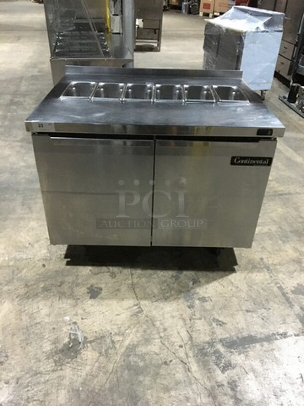Continental Commercial Refrigerated Sandwich Prep Table! With 2 Door Underneath Storage Space! All Stainless Steel! Model SW4812 Serial 15766669! 115V 1Phase! On Commercial Casters!