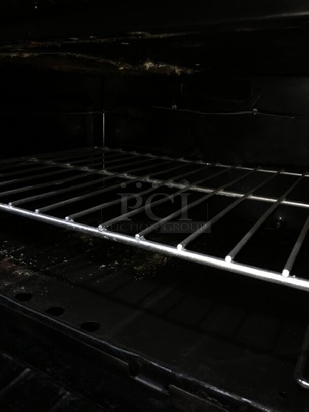 All Stainless Steel Commercial Natural Gas Powered 6 Burner Stove With Raised Flat Top Grill Combo! With Cheese Melter! With Double Full Size Oven Underneath! With Raised Backsplash And Salamander Shelf! On Commercial Casters! - Image 9 of 12