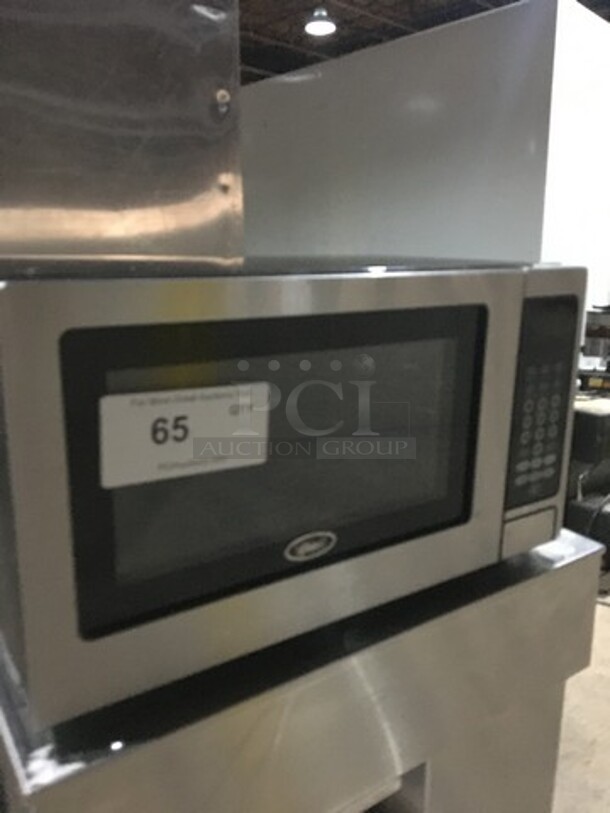 Oster Countertop Microwave Oven! With View Through Door! All Stainless Steel! Model OGZD0701! 120V 1Phase!