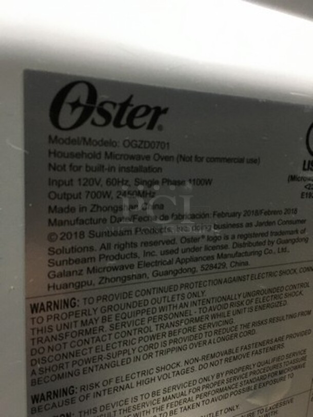 Oster Countertop Microwave Oven! With View Through Door! All Stainless Steel! Model OGZD0701! 120V 1Phase! - Image 5 of 8