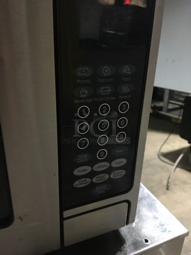 Oster Countertop Microwave Oven! With View Through Door! All Stainless Steel! Model OGZD0701! 120V 1Phase! - Image 7 of 8