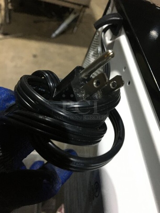 Oster Countertop Microwave Oven! With View Through Door! All Stainless Steel! Model OGZD0701! 120V 1Phase! - Image 8 of 8