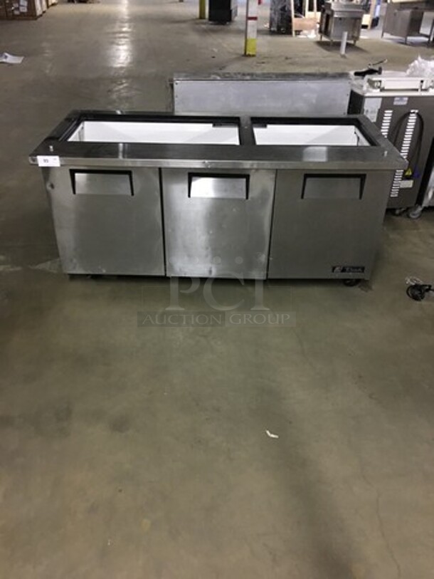 True Commercial Refrigerated Sandwich Prep Table! With 3 Door Underneath Storage Space! All Stainless Steel! Model TSSU7230MBST Serial 7648877! 115V 1Phase! On Commercial Casters!