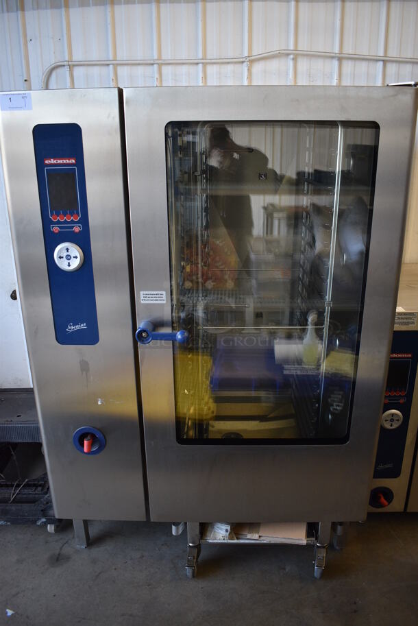 BRAND NEW! GORGEOUS! 2006 Eloma Model Genius 20-21 Stainless Steel Commercial Floor Style Electric Powered Combi Steamer Convection Oven w/ Metal Pan Rack on Commercial Casters. 208 Volts, 3 Phase. 51.5x45x76 - Image 1 of 8
