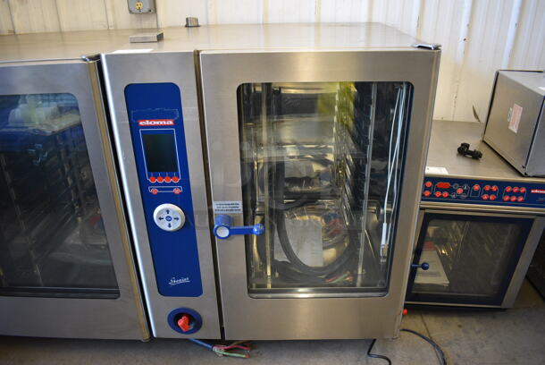 BRAND NEW! GORGEOUS! 2006 Eloma Model Genius 10-11 Stainless Steel Commercial Electric Powered Combi Steamer Convection Oven w/ Metal Pan Rack. 208 Volts, 3 Phase. 36.5x34x45 - Image 1 of 8