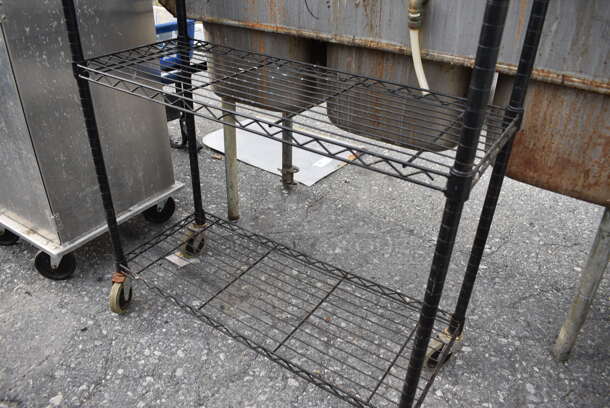 Black Finish 4 Tier Metro Style Shelving Unit on Casters. 36x14x59. BUYER MUST DISMANTLE. PCI CANNOT DISMANTLE FOR SHIPPING. PLEASE CONSIDER FREIGHT CHARGES - Image 2 of 2