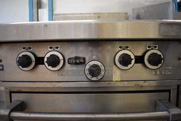 NICE! Garland Model H28 Stainless Steel Commercial Natural Gas Powered 4 Burner Range w/ Lower Oven on Commercial Casters. 24x33x45 - Image 5 of 10