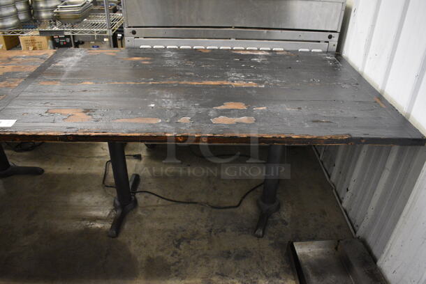 Wooden Table on 2 Black Metal Table Bases. 64x37x30