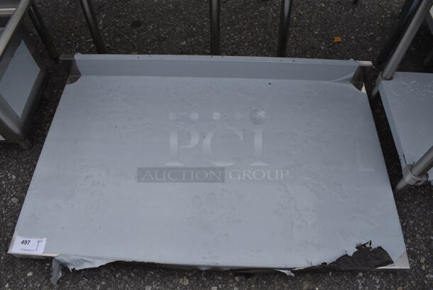 BRAND NEW SCRATCH AND DENT! Stainless Steel Commercial Tabletop w/ Backsplash. 48x30x7 - Image 1 of 3