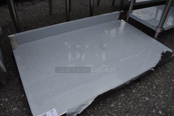 BRAND NEW SCRATCH AND DENT! Stainless Steel Commercial Tabletop w/ Backsplash. 48x30x7 - Image 2 of 3