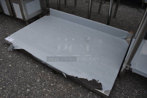 BRAND NEW SCRATCH AND DENT! Stainless Steel Commercial Tabletop w/ Backsplash. 48x30x7 - Image 3 of 3