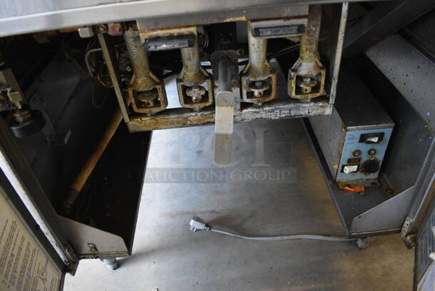 SWEET! 2006 Pitco Frialator Model 24RUFM Stainless Steel Commercial Floor Style Natural Gas Powered Deep Fat Donut Fryer. 72,000 BTU. 32x44x57 - Image 7 of 8