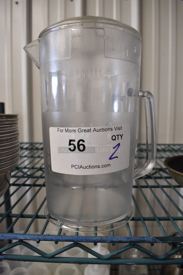 2 Clear Poly Pitchers. 7x5x9. 2 Times Your Bid!