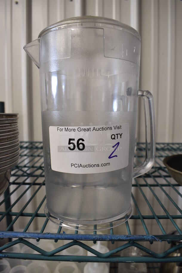 2 Clear Poly Pitchers. 7x5x9. 2 Times Your Bid! - Image 1 of 2