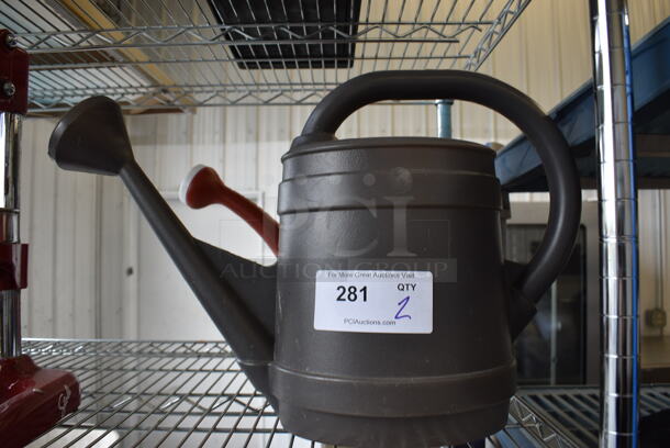 2 Poly Watering Cans. 6x20x14. 2 Times Your Bid!