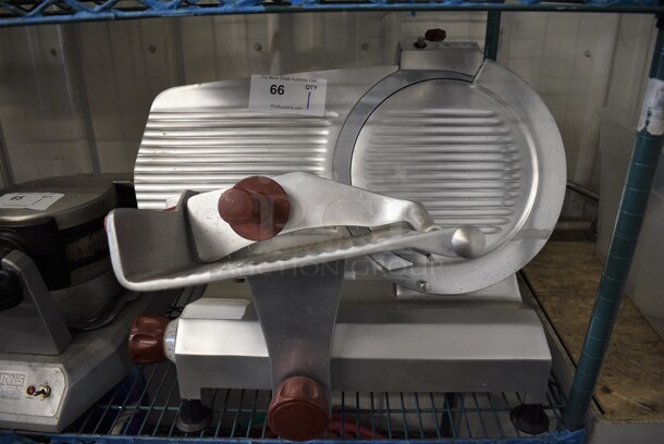 NICE! Fleetwood Model EF12 Stainless Steel Commercial Countertop Meat Slicer. 115 Volts, 1 Phase. 23x18x19. Tested and Working!