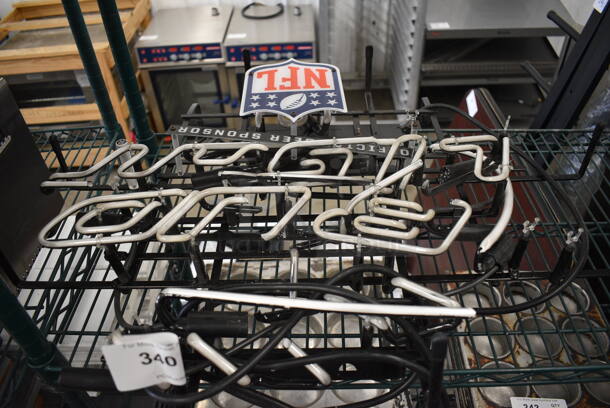 Bud Light Neon Light Up Sign. See Pictures For Damage. 27x6x22. Buyer Must Pick Up - We Will Not Ship This Item. - Image 1 of 3