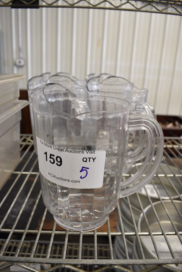 5 Clear Poly Pitchers. 7x5x8. 5 Times Your Bid!