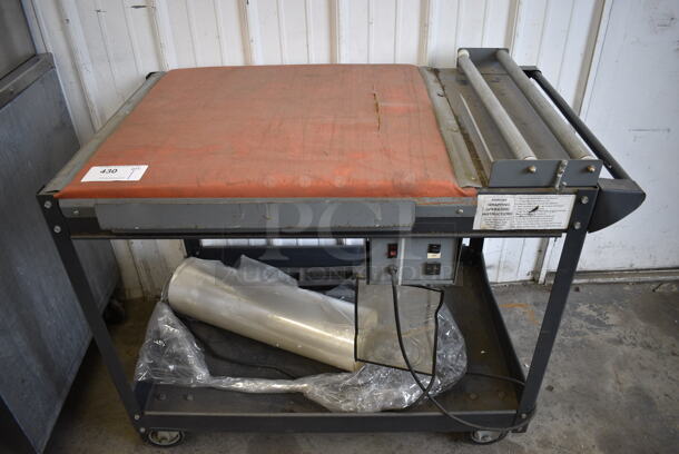 Metal Commercial Floor Style Shrink Wrapping Machine on Commercial Casters. 26x40x34
