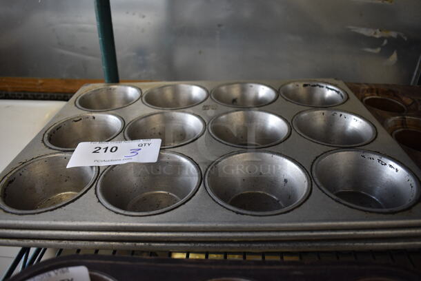 3 Metal 12 Cup Muffin Baking Pans. 18x13.5x2. 3 Times Your Bid! - Image 1 of 2