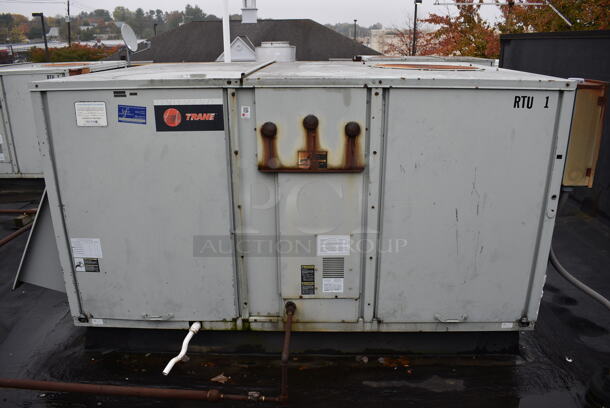 GREAT! Trane Model YCD120B3H0DB Metal Commercial Rooftop Air Conditioner. 208-230 Volts, 3 Phase. BUYER MUST REMOVE. 117x64x49 - Image 1 of 11