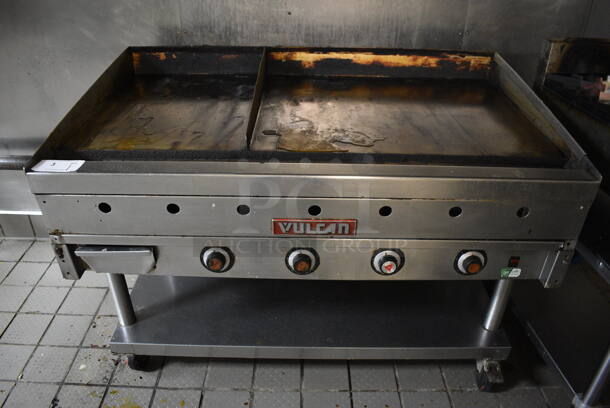 SWEET! Vulcan Stainless Steel Commercial Gas Powered Flat Top Griddle w/ Thermostatic Controls and Undershelf on Commercial Casters. BUYER MUST REMOVE. 48x31x37