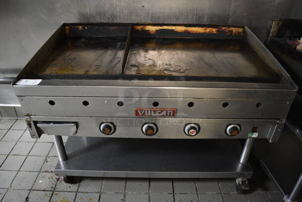 SWEET! Vulcan Stainless Steel Commercial Gas Powered Flat Top Griddle w/ Thermostatic Controls and Undershelf on Commercial Casters. BUYER MUST REMOVE. 48x31x37 - Image 1 of 6