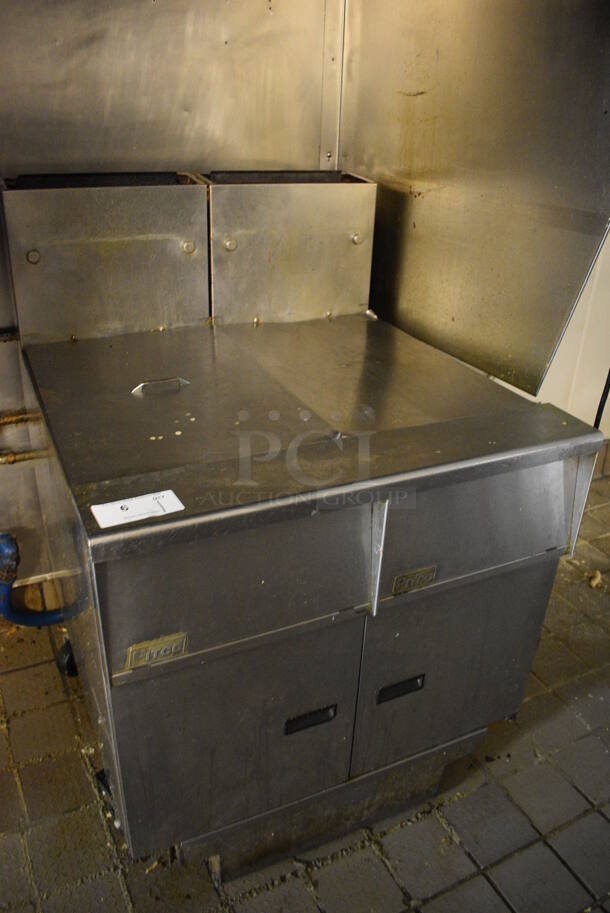 WOW! 2010 Pitco Frialator Model SG14 Stainless Steel Commercial Natural Gas Powered 2 Bay Deep Fat Fryer w/ Filtration System and 2 Lids on Commercial Casters. 110,000 BTU. BUYER MUST REMOVE. 31.5x31.5x46 - Image 2 of 7