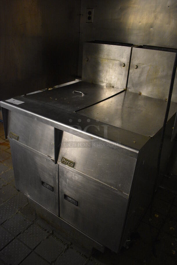 WOW! 2010 Pitco Frialator Model SG14 Stainless Steel Commercial Natural Gas Powered 2 Bay Deep Fat Fryer w/ Filtration System and 2 Lids on Commercial Casters. 110,000 BTU. BUYER MUST REMOVE. 31.5x31.5x46 - Image 4 of 7