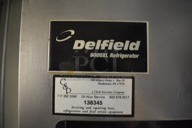 NICE! Delfield Model 6025XL-SH-RR1 Stainless Steel Commercial 2 Half Size Door Reach In Cooler on Commercial Casters. 115 Volts, 1 Phase. 25.5x32.5x79 - Image 3 of 7