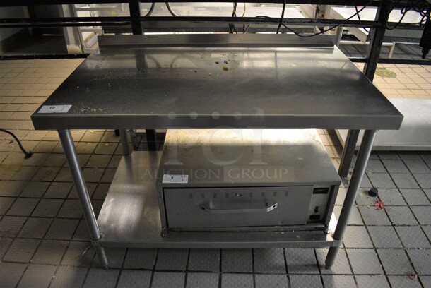 Stainless Steel Commercial Table w/ Metal Undershelf. BUYER MUST REMOVE. 48x30x36 - Image 1 of 3