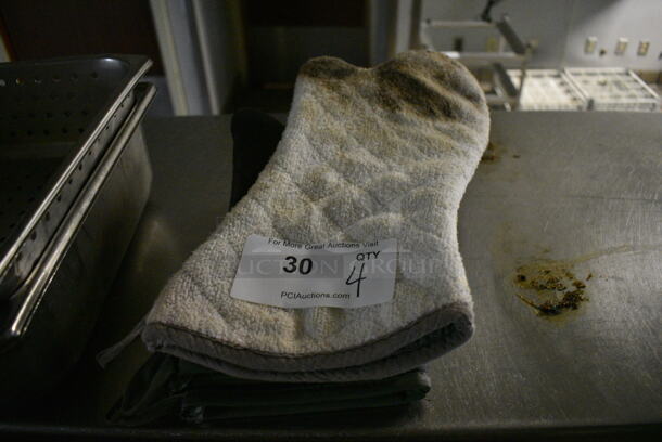 4 Oven Mitts. 15x7. 4 Times Your Bid! - Image 1 of 2