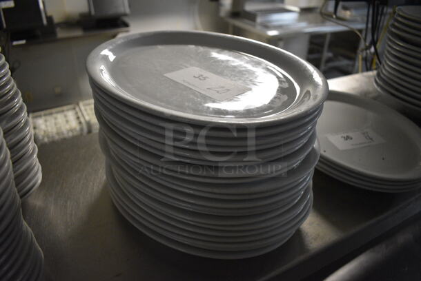 20 White Ceramic Oval Plates. 13x10x1. 20 Times Your Bid!