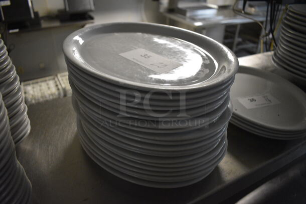 20 White Ceramic Oval Plates. 13x10x1. 20 Times Your Bid! - Image 1 of 2