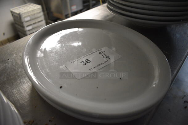 4 White Ceramic Oval Plates. 13x10x1. 4 Times Your Bid!