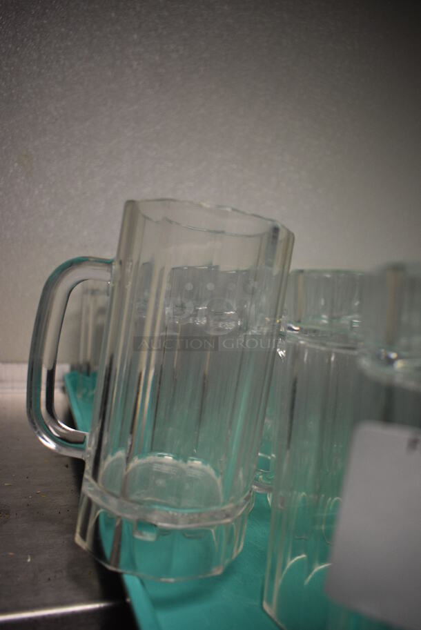 29 Poly Clear Tall Mugs on Green Tray. 4.5x3.5x6.5. 29 Times Your Bid! - Image 2 of 3