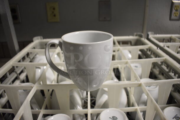 16 White Ceramic Mugs in Dish Caddy. 5x4x4. 16 Times Your Bid!