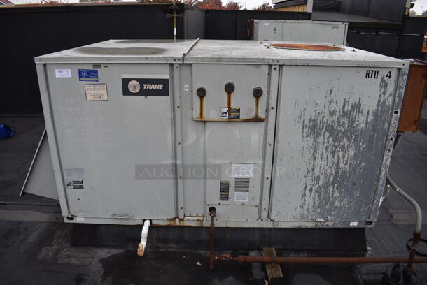 GREAT! Trane Model YCD120B3H0DB Metal Commercial Rooftop Air Conditioner. 208-230 Volts, 3 Phase. BUYER MUST REMOVE. 117x64x49