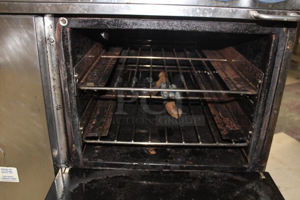 TERRIFIC! Electrolux Model ACFG36 Commercial Stainless Steel Natural Gas 6 Burner Range With Oven On Commercial Casters. 36x32.5x37. Working When Removed!  - Image 3 of 8