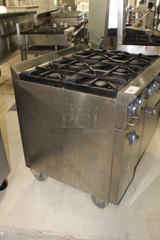 TERRIFIC! Electrolux Model ACFG36 Commercial Stainless Steel Natural Gas 6 Burner Range With Oven On Commercial Casters. 36x32.5x37. Working When Removed!  - Image 8 of 8
