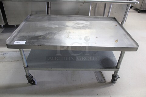 NICE! Serv-Ware Model ESG3048H-CWP Commercial Stainless Steel Equipment Stand with Galvanized Undershelf On Commercial Casters. 48x30x26.5