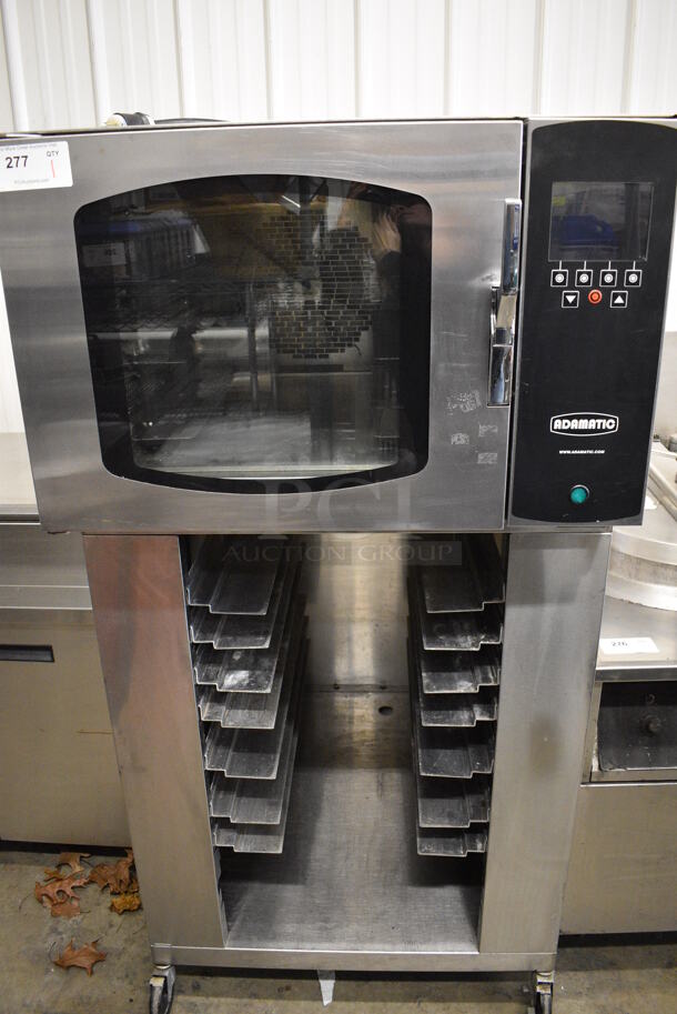 BEAUTIFUL! 2008 Adamatic Mono Model FG189-U82 Stainless Steel Commercial Electric Powered Convection Oven w/ View Through Door and Pan Rack on Commercial Casters. 208 Volts, 3 Phase. 32.5x44x67